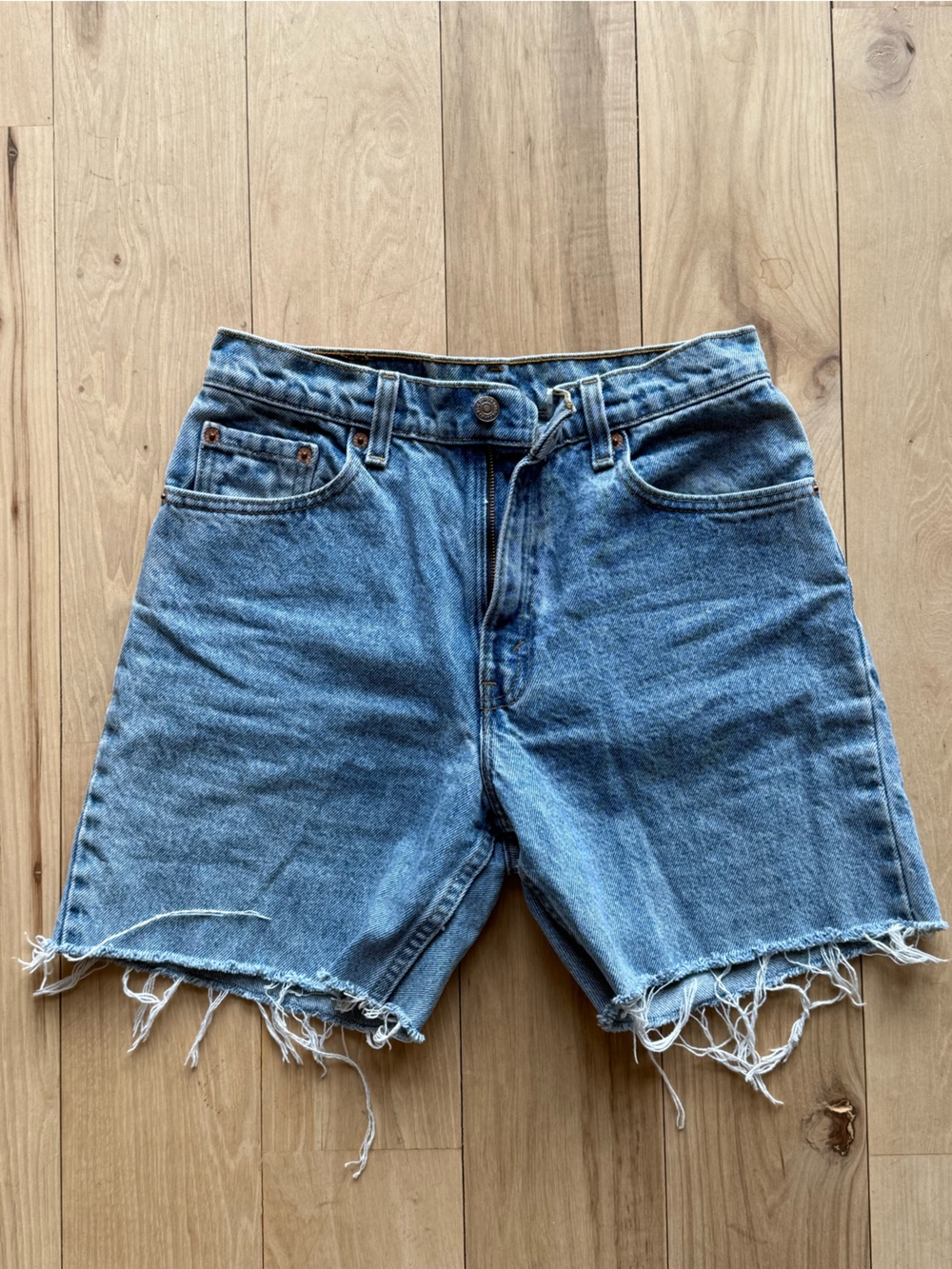 Vintage Levi's Light Blue Distressed Cropped Denim Shorts USA